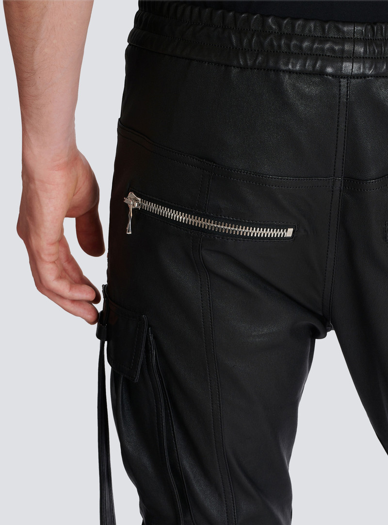 Leather trousers with strap 9