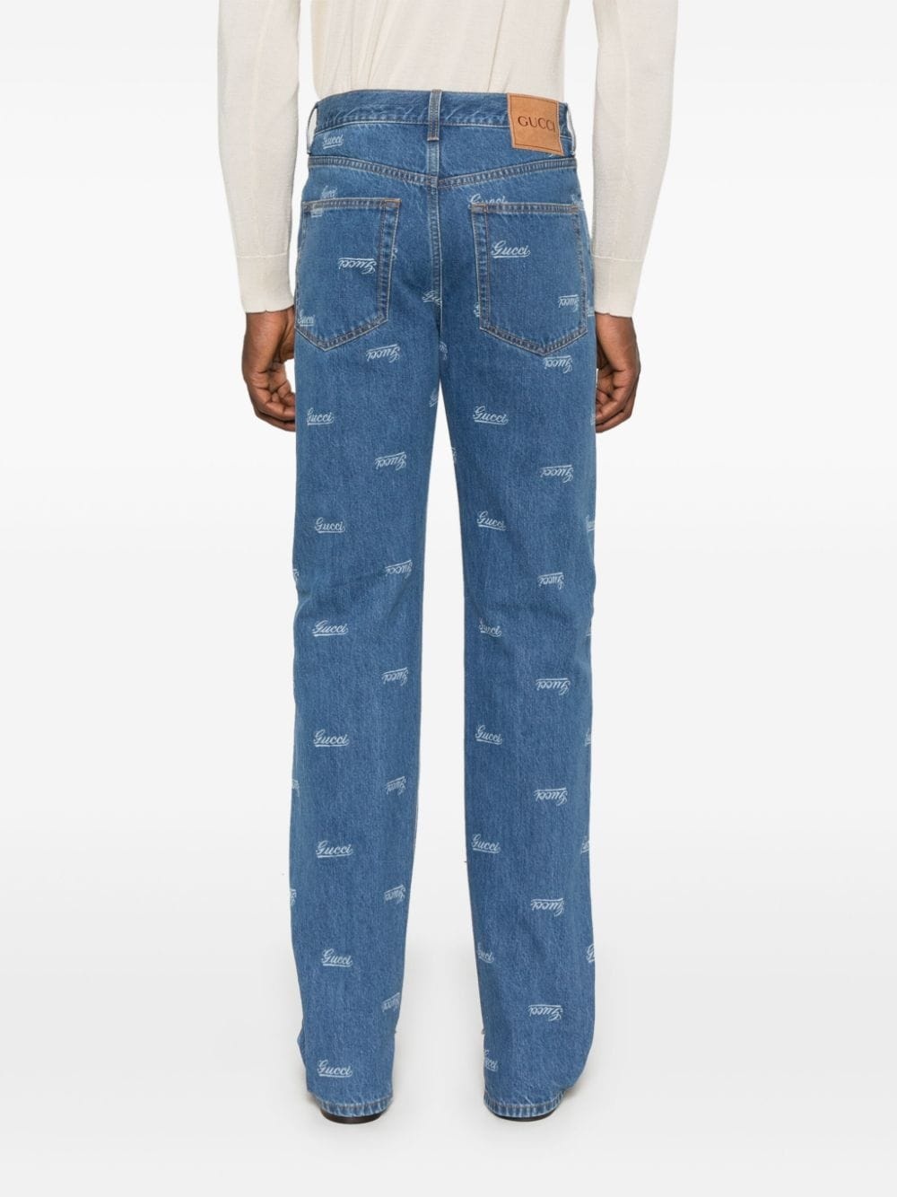 GUCCI logo print jeans farfetch REVERSIBLE