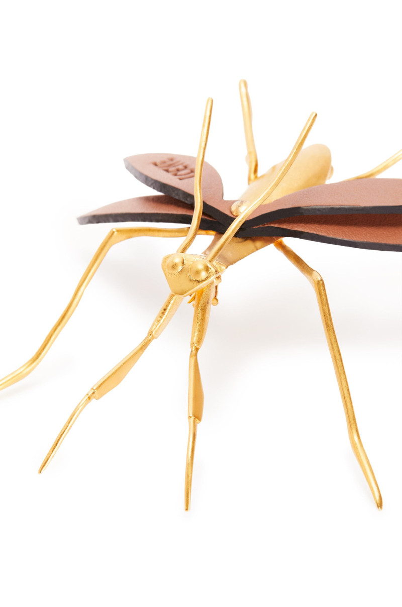 Brooch in metal and calfskin 4