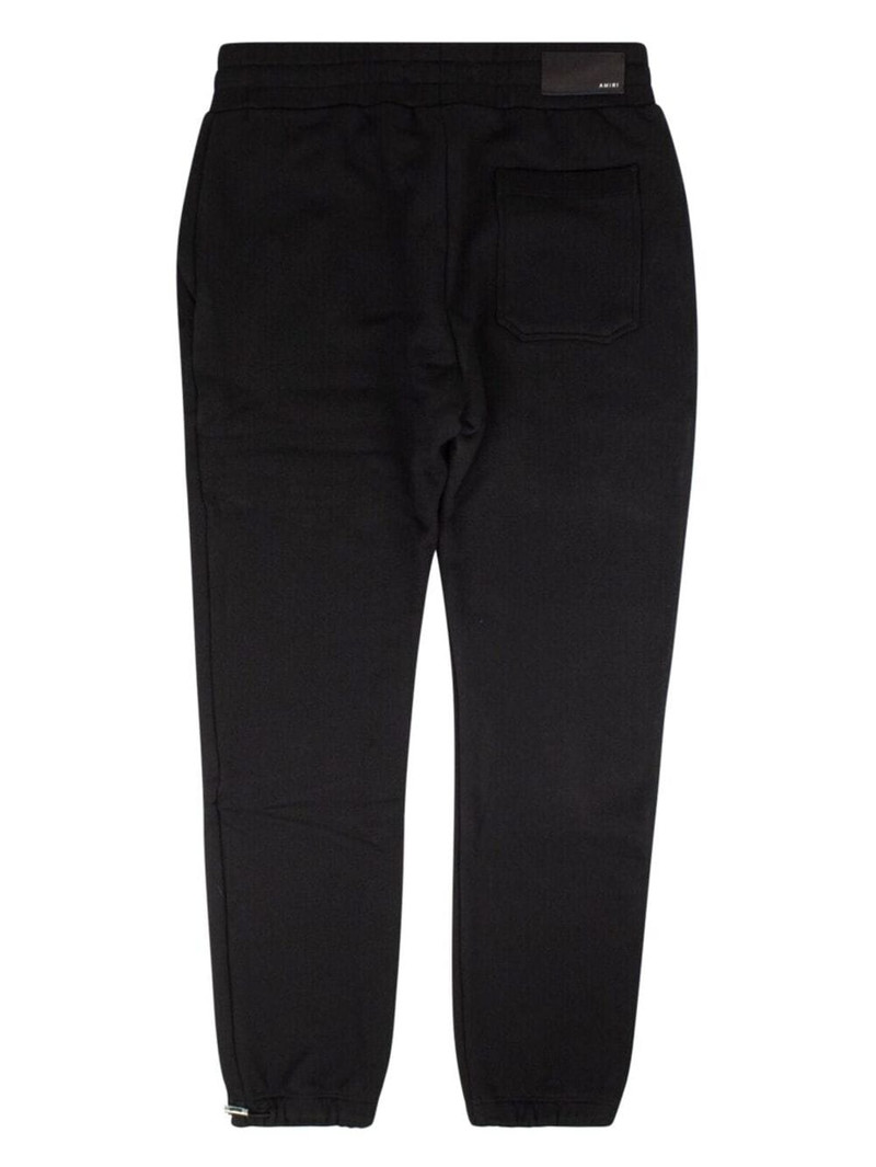 AMIRI logo-print cotton track pants outlook