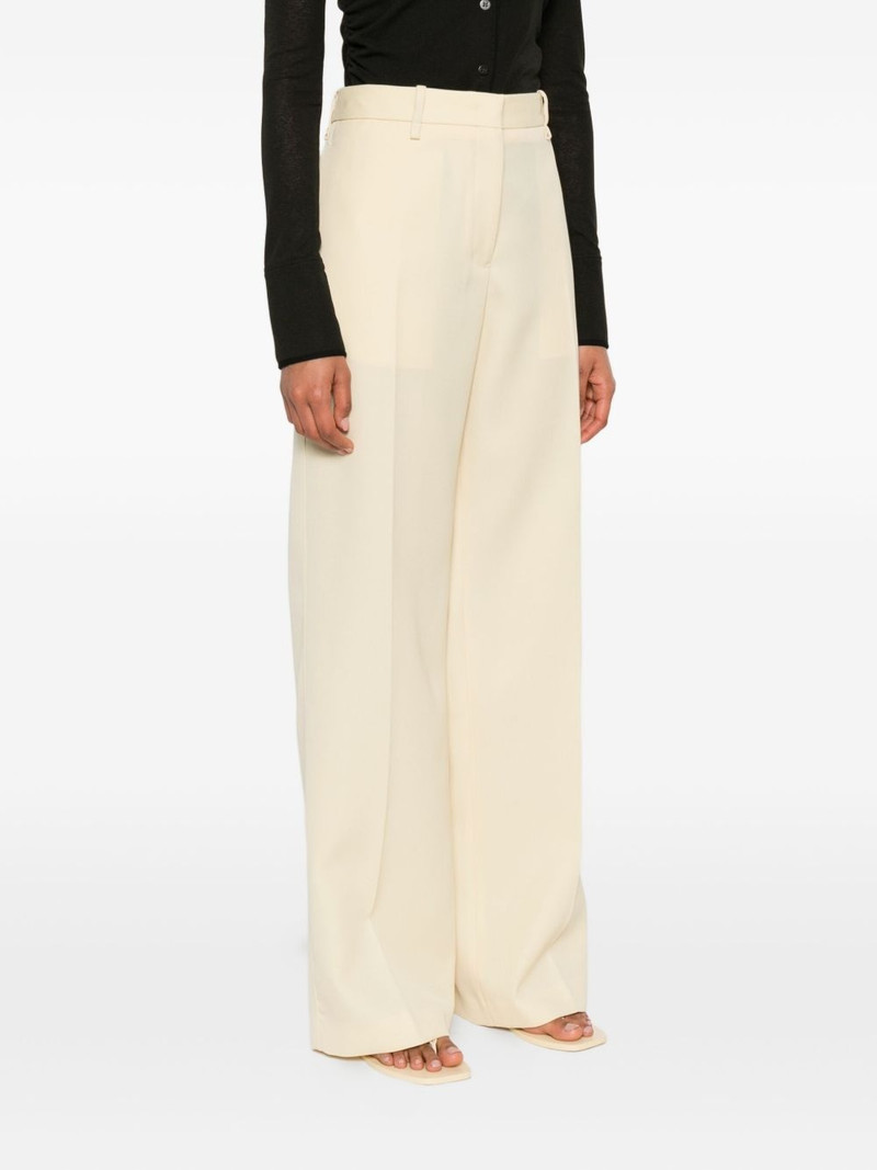 high-waisted wool trousers 3