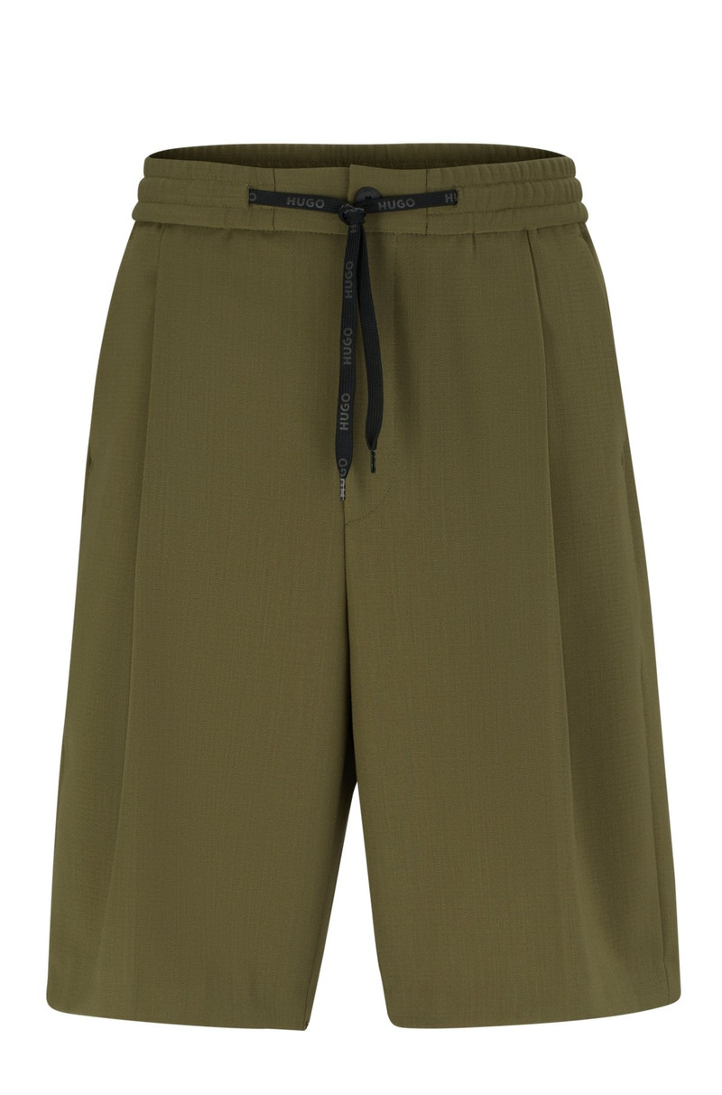 RELAXED-FIT SHORTS IN STRUCTURED PERFORMANCE-STRETCH FABRIC 1