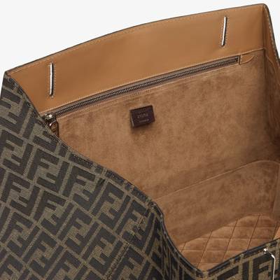 FENDI Suitcase with side opening, made of fabric with jacquard FF motif and beige leather. Snap clasp with outlook