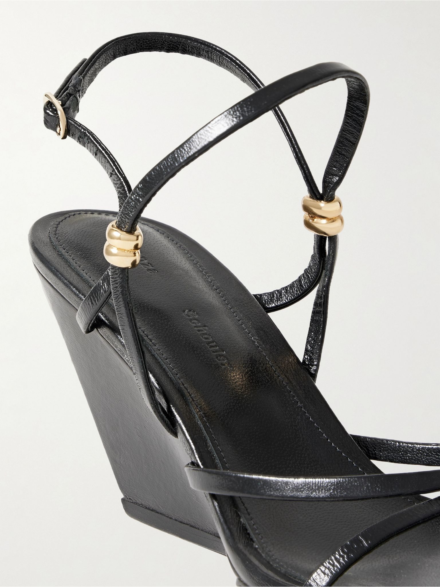 Coil embellished crinkled glossed-leather wedge sandals Black - 4