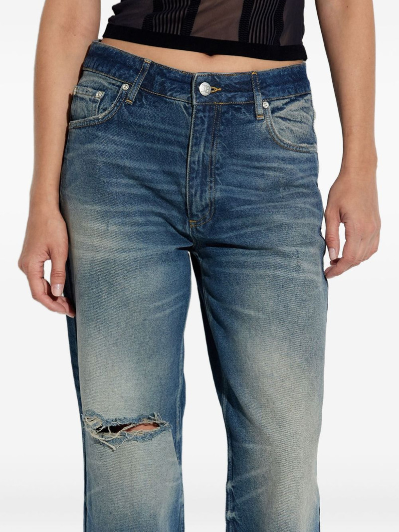 frayed-knee jeans 3