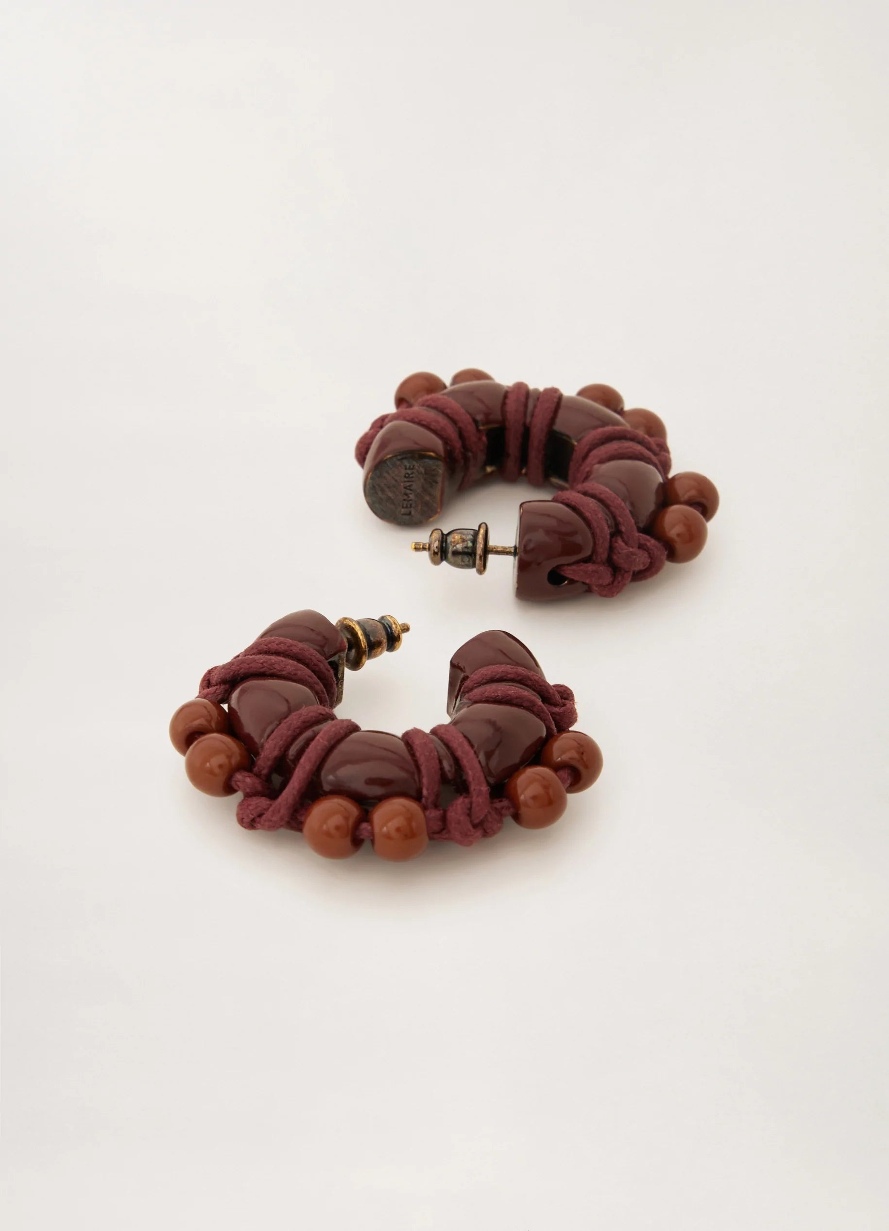 TIED UP PEARLS HOOPS
BRASS - 2