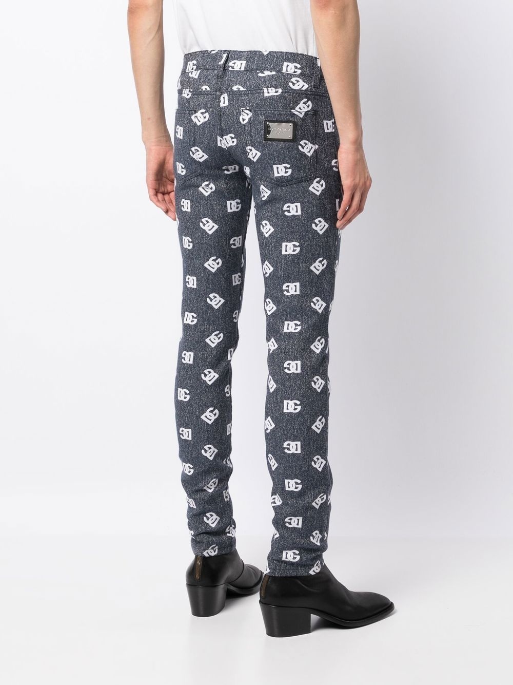 slim-cut monogram-print jeans - 4