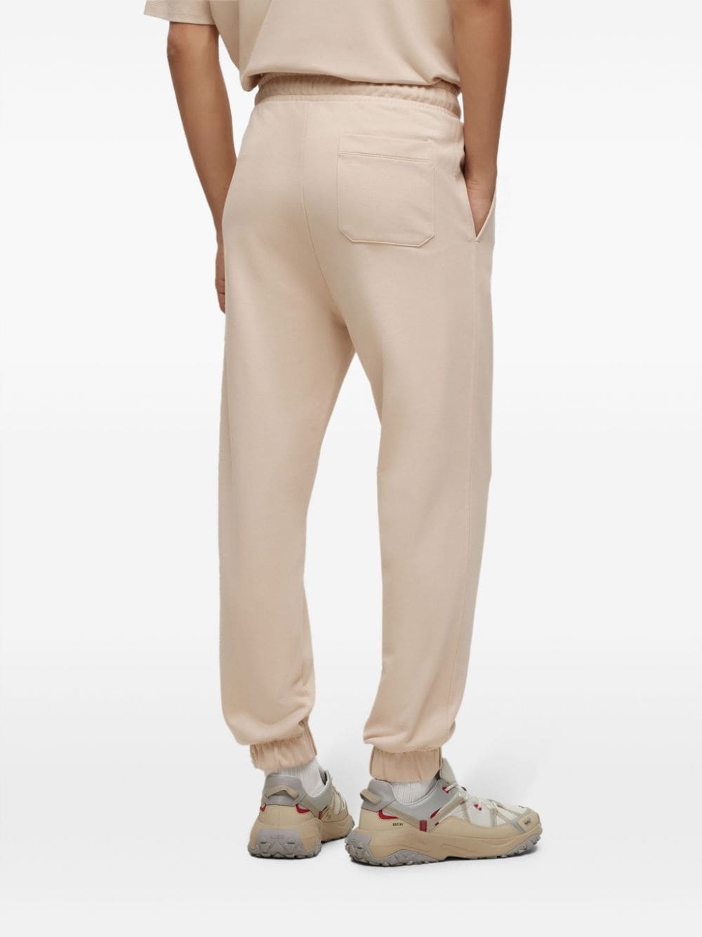logo-embossed track pants - 4