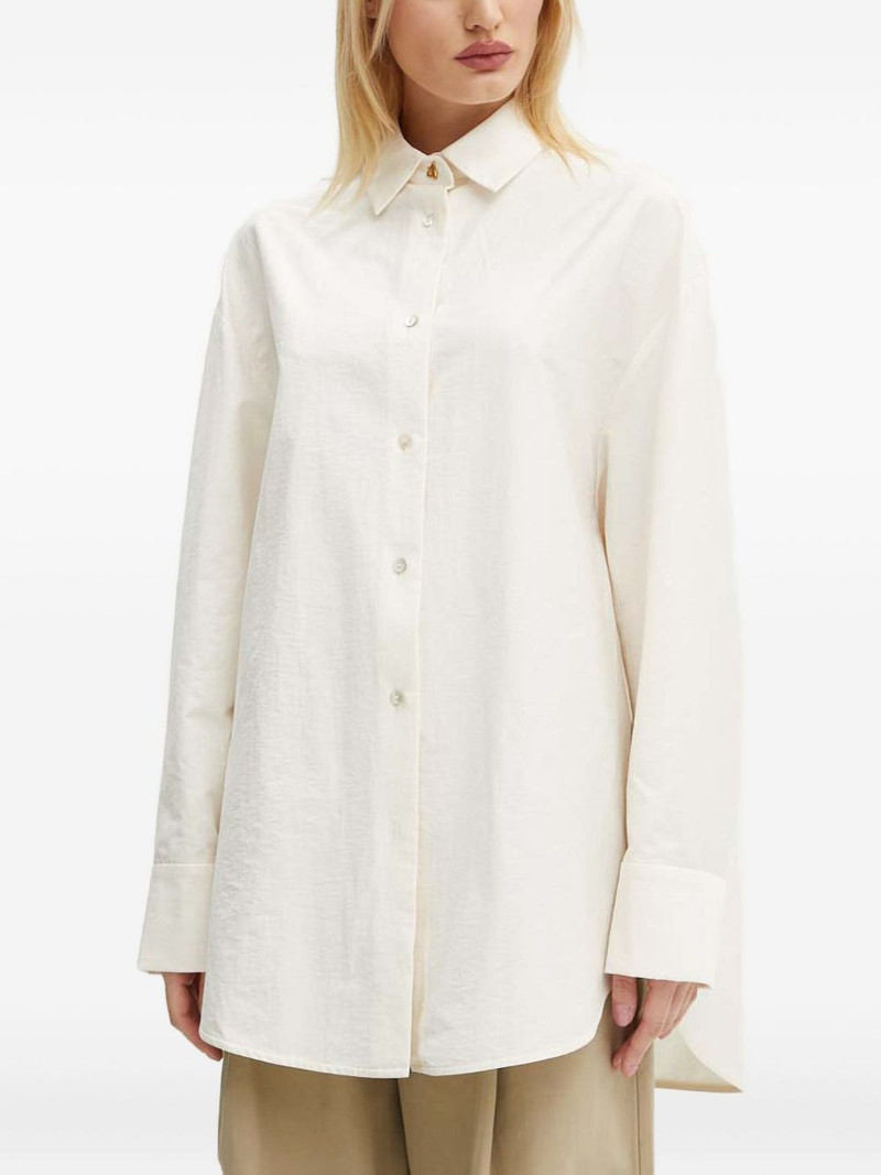 triangle-button shirt 1