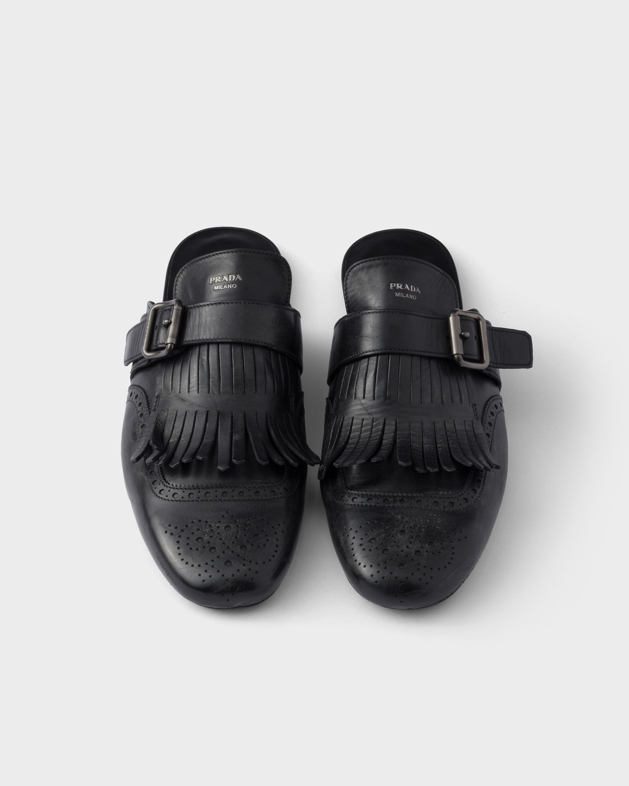 Shuffle antiqued leather mules with buckled strap and fringe - 4