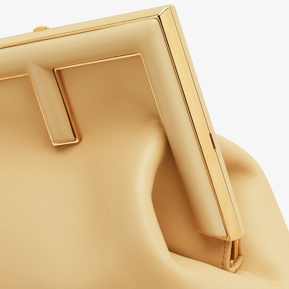 Medium Fendi First bag made of soft, sand-colored nappa leather with oversized metal F clasp bound i - 5