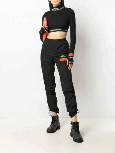 Heron Preston CTNMB long-sleeved crop top outlook