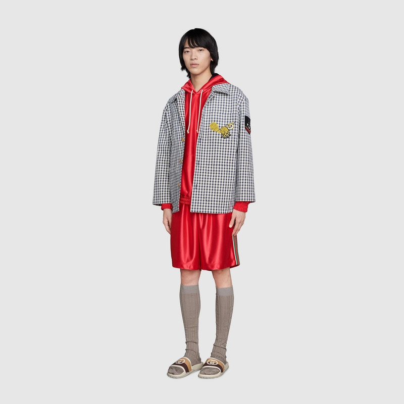 GUCCI Shiny jersey shorts with Web outlook