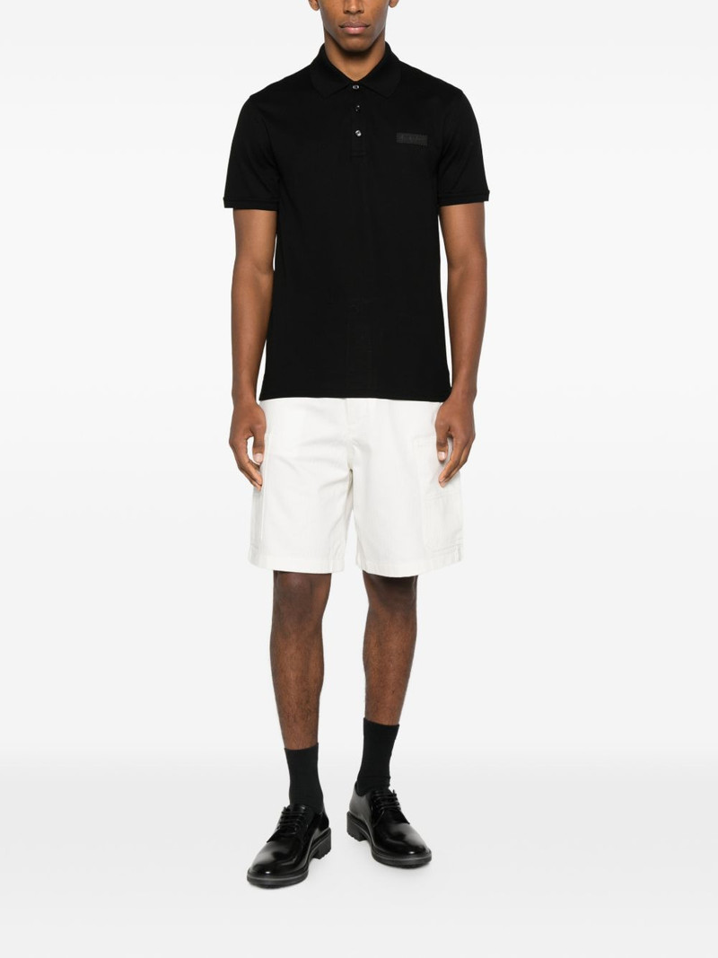 Givenchy logo-patch polo shirt outlook