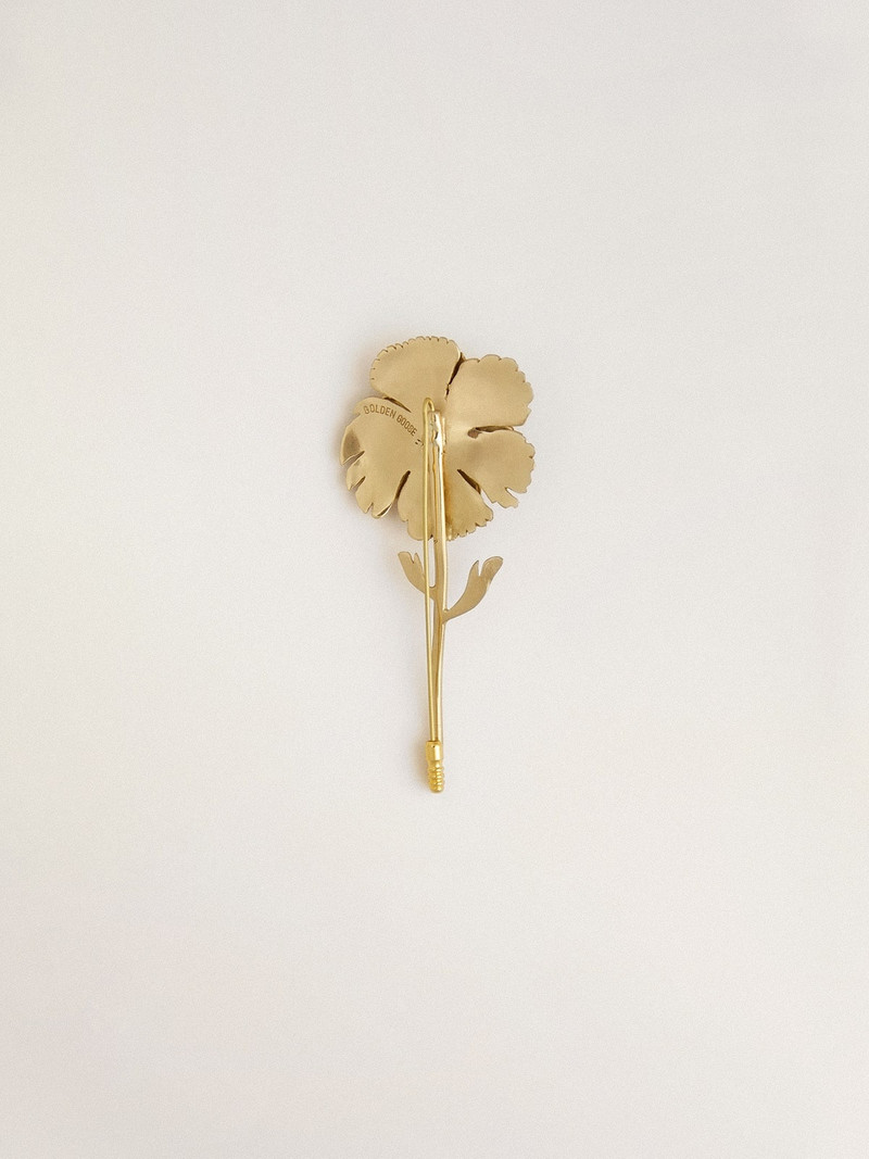 Golden Goose Gold pin with floral design outlook