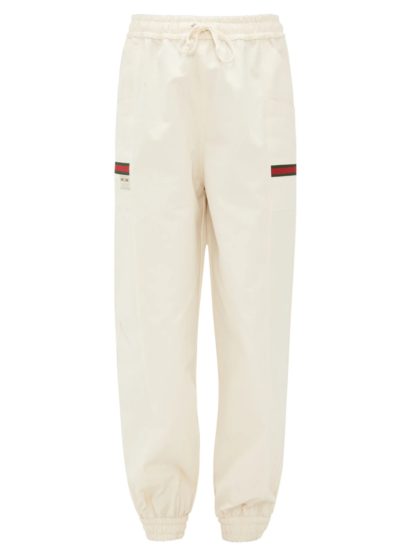 Web-striped cotton-canvas track pants - 1