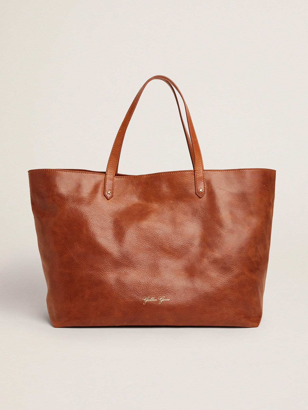 Pasadena Bag in tan-colored glossy leather with gold logo on the front - 1