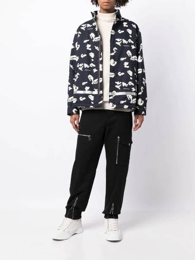 UNDERCOVER all-over logo light jacket outlook