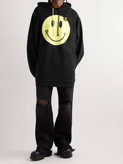 Raf Simons + Smiley Oversized Logo-Print Distressed Cotton-Jersey Hoodie outlook