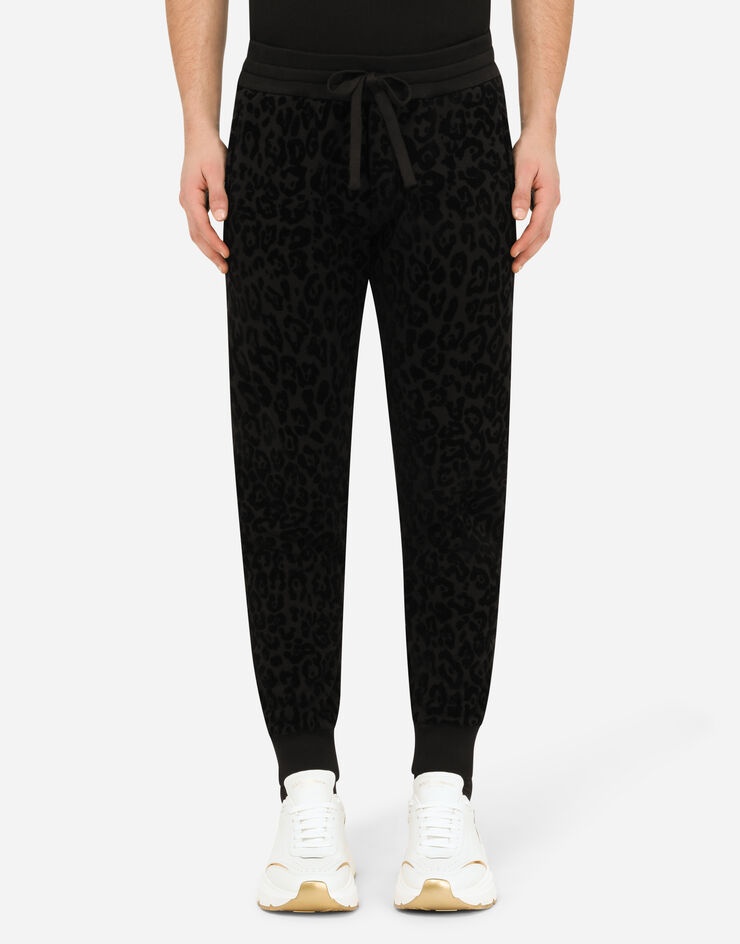 Jogging pants with flocked leopard print - 1