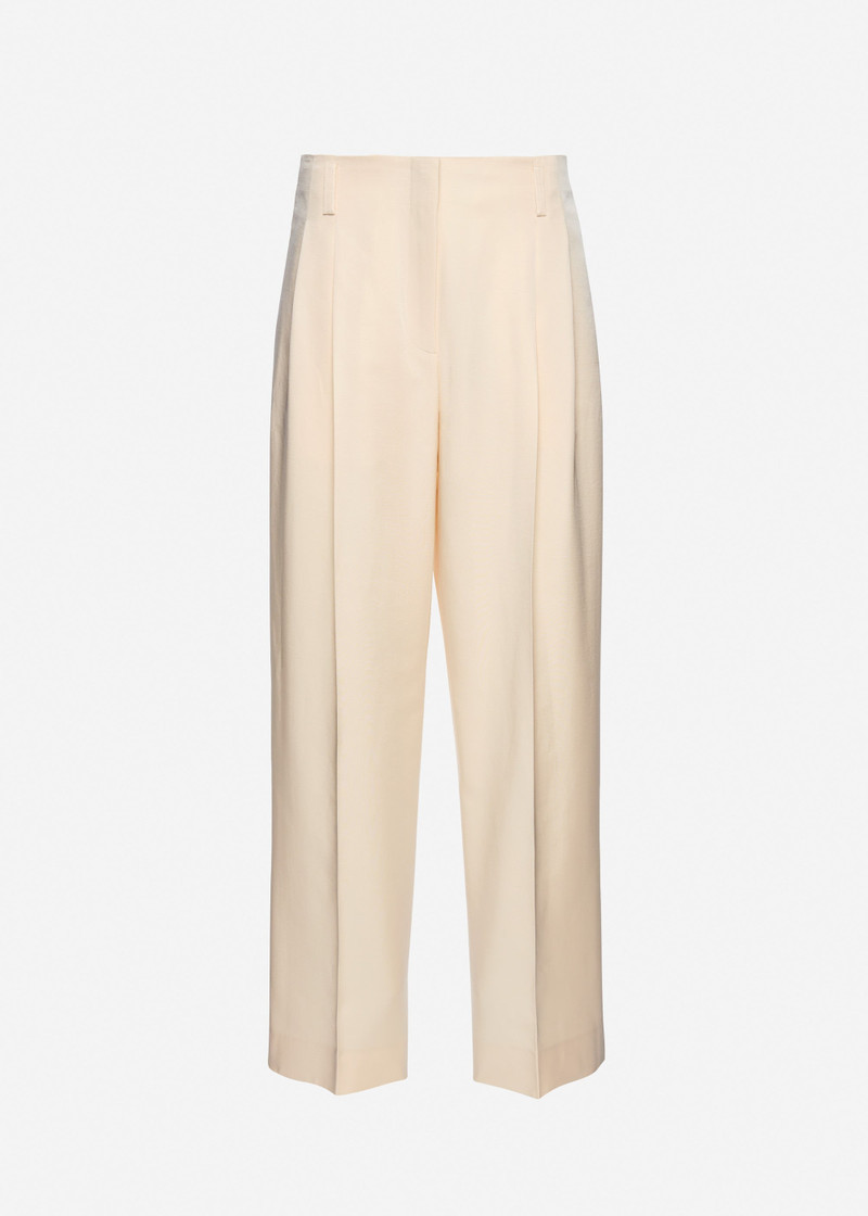Tapered cotton and silk trousers in cream 1