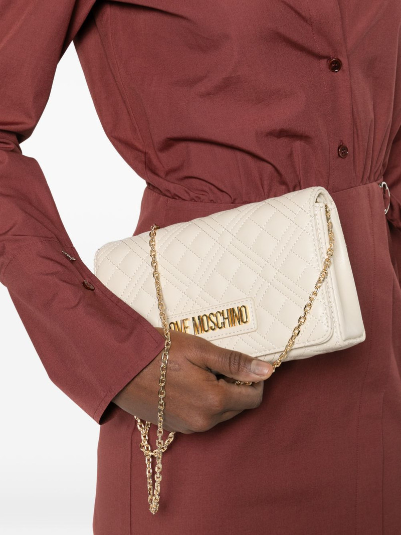 Moschino quilted chain clutch bag outlook