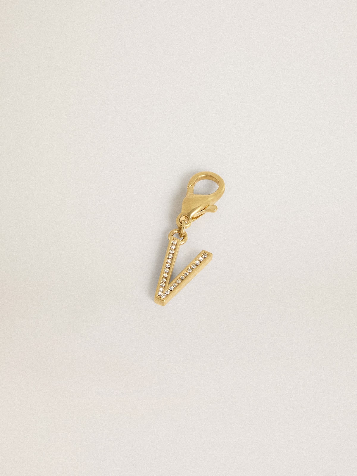 Letter V charm in gold-colored brass with crystals - 2