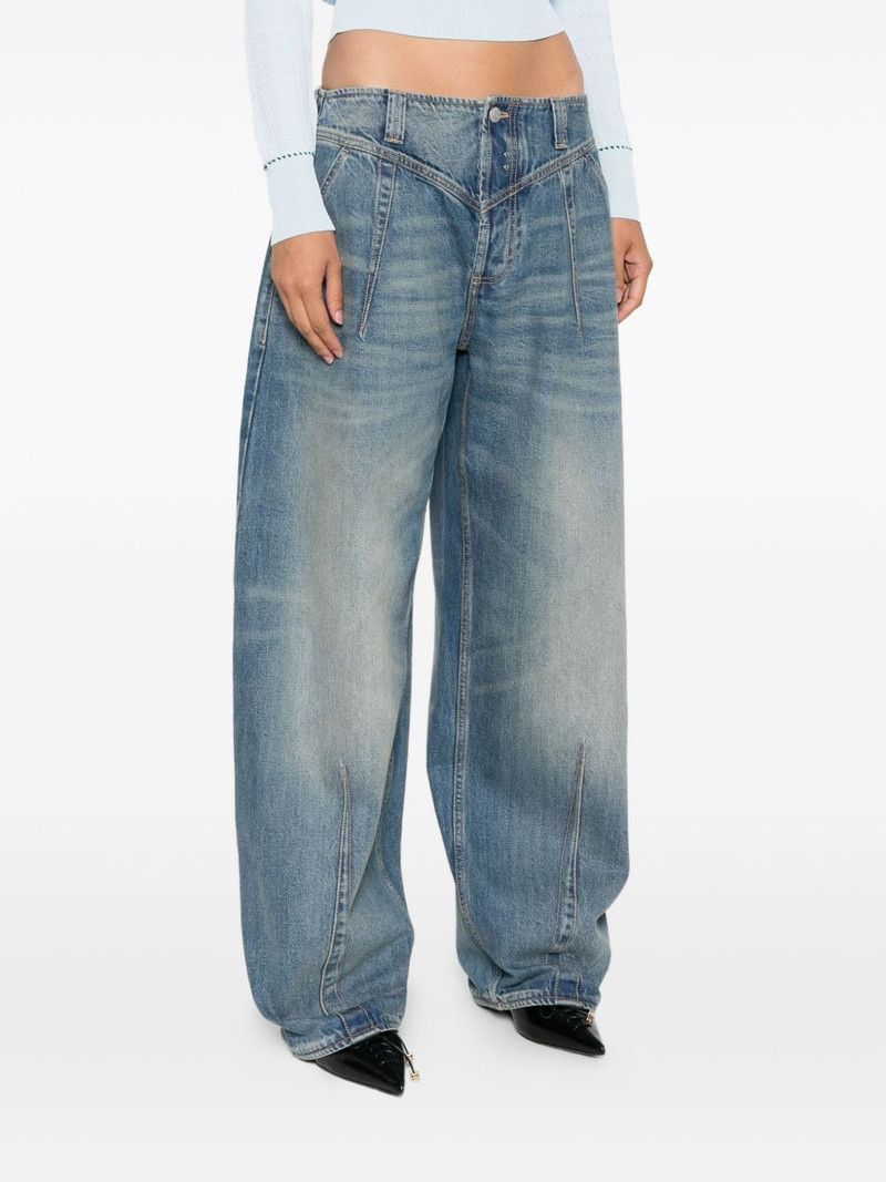 whiskering-effect jeans 3