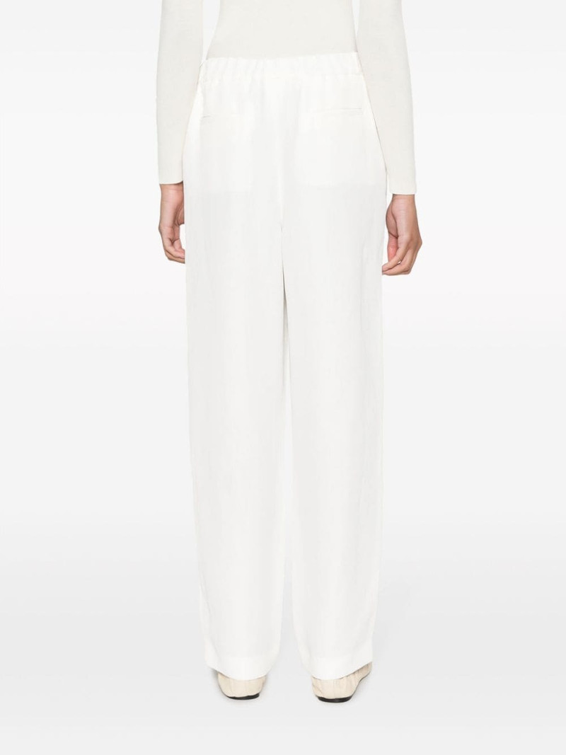 elasticated-waist tapered trousers 4
