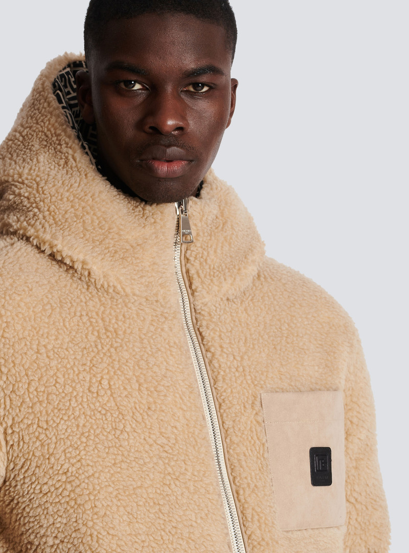 Monogrammed reversible puffer jacket 7