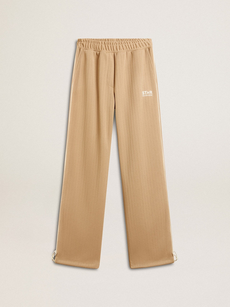 Women’s light beige joggers with white logo 1