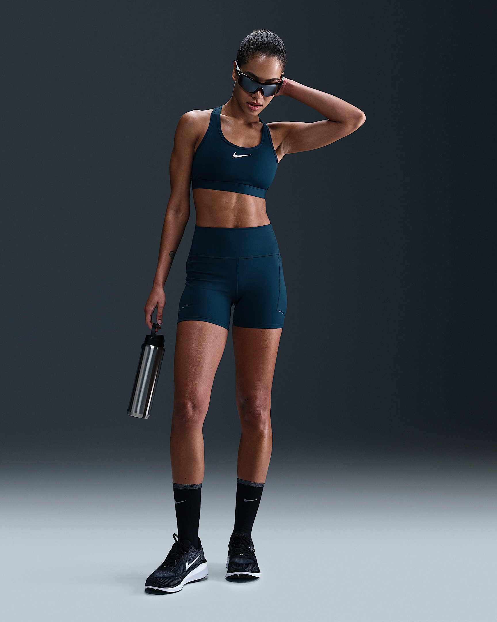 Nike Swift Women's High-Waisted 4" Tight Running Shorts with Pockets - 1