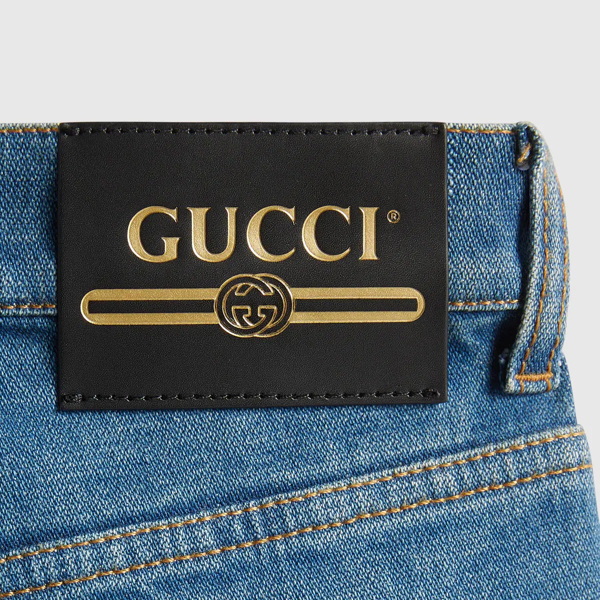 Washed denim flare pant with Gucci label - 8