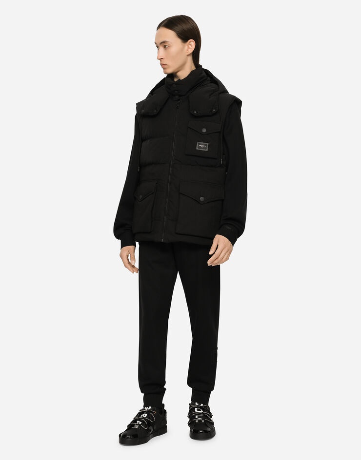 Quilted gilet with hood and branded plate - 1