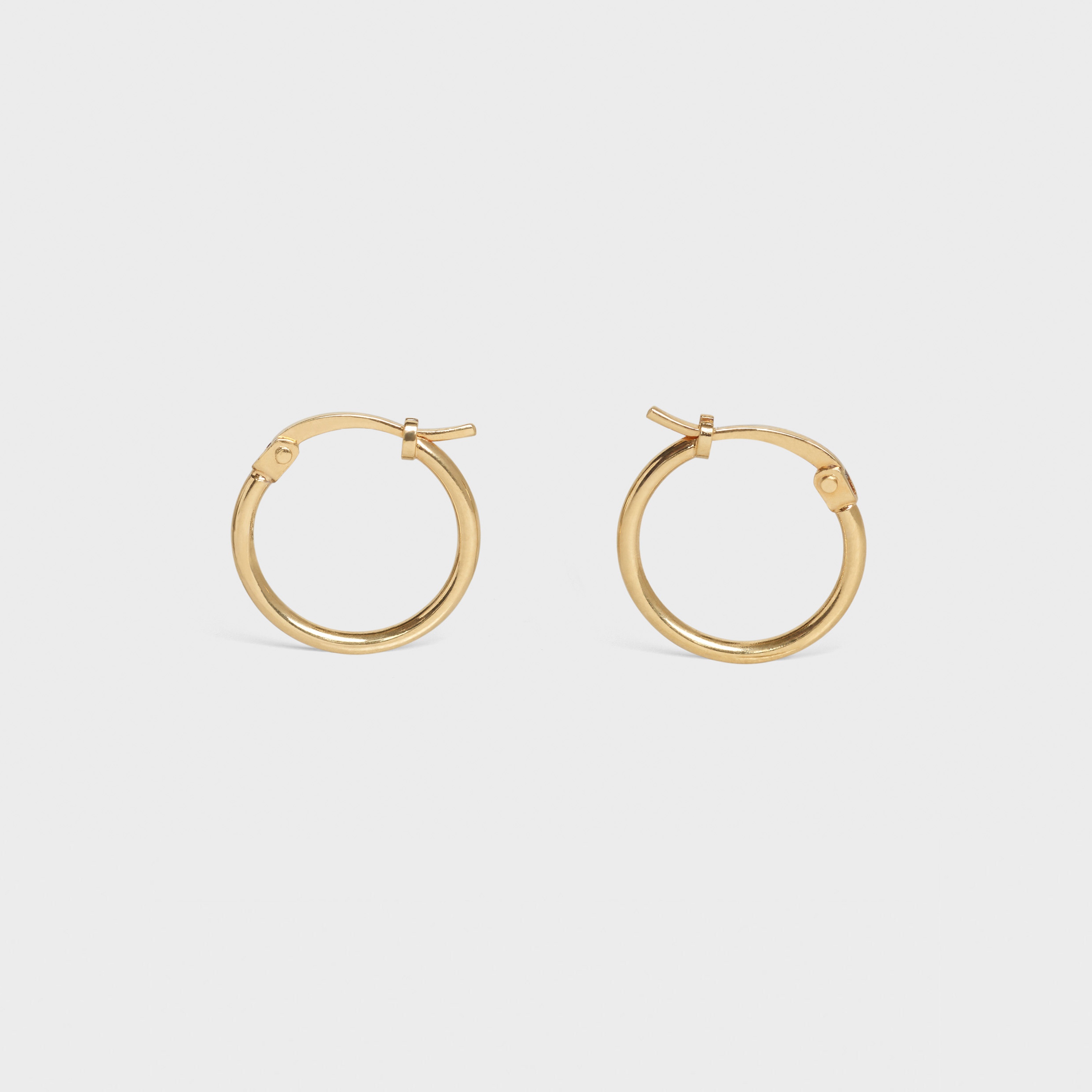 SIMPLE FORMS EXTRA SMALL HOOPS  IN  BRASS WITH GOLD FINISH - 1