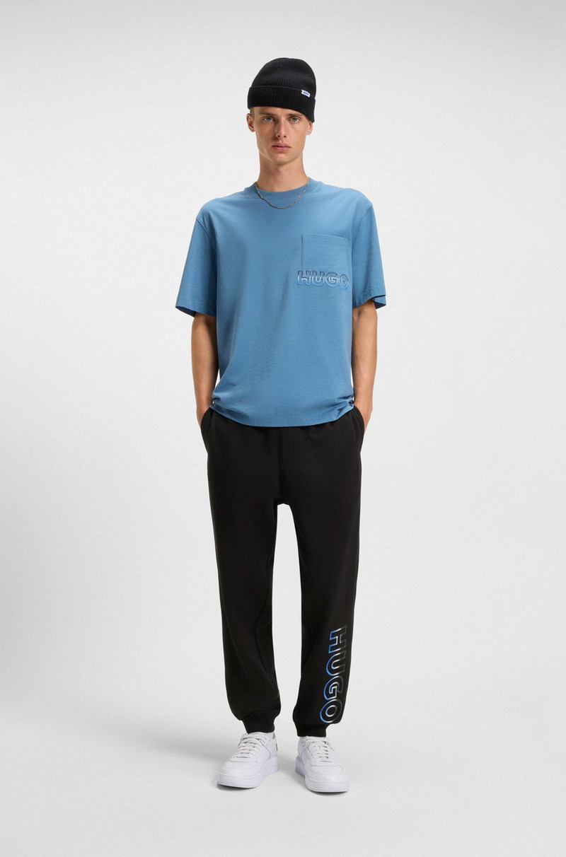HUGO COTTON-TERRY TRACKSUIT BOTTOMS WITH OMBRÉ LOGO EMBROIDERY outlook