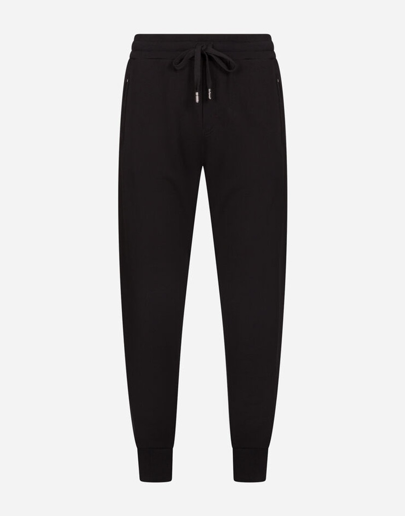 Jogging pants with rubberized logo patch 3