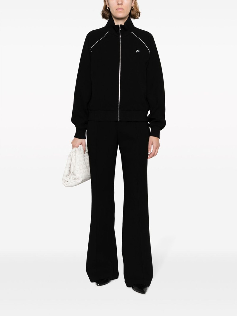 TORY BURCH striped flared trousers outlook