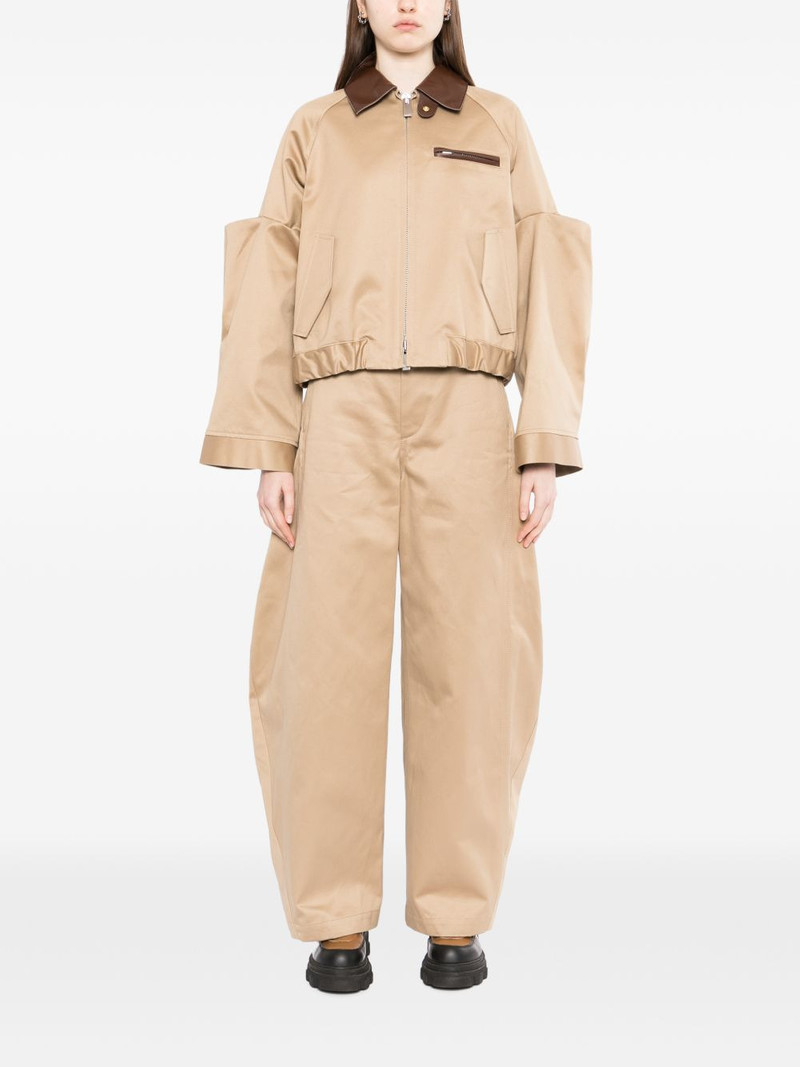 sacai belted cotton tapered trousers outlook