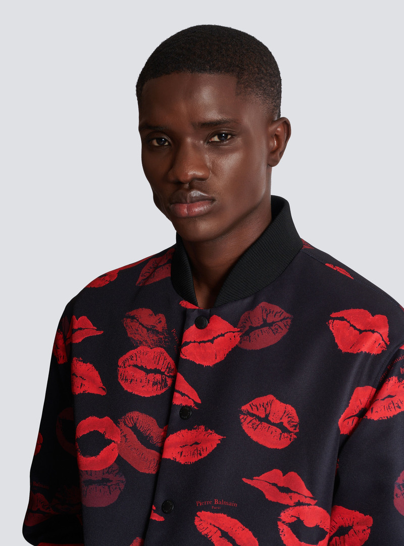 Reversible bomber jacket in plain and Kiss-print nylon 7