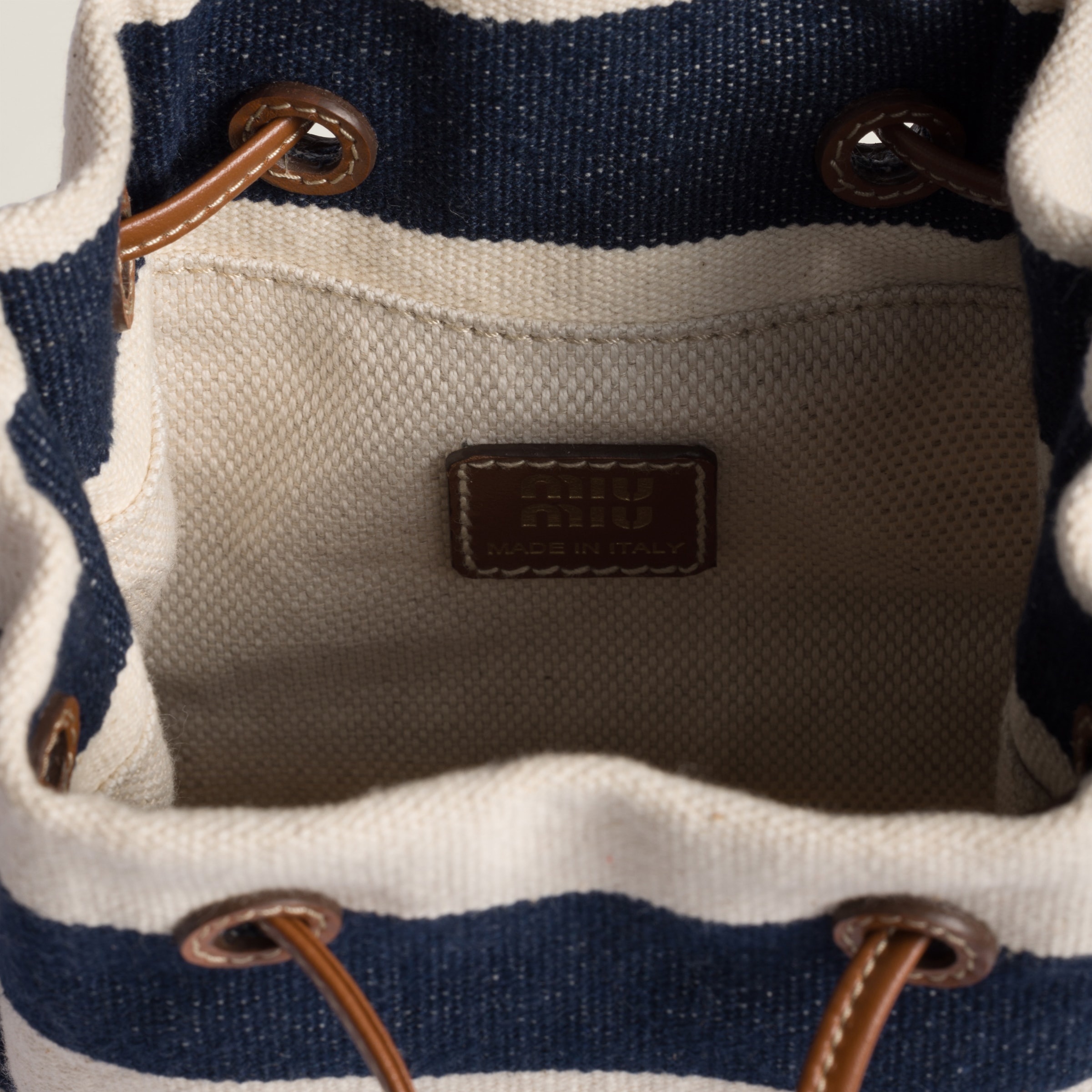 ☆送料・関税込☆MIUMIU★Striped Fabric Drawstring Pouch★ Miu Miu Striped fabric drawstring pouch | REVERSIBLE