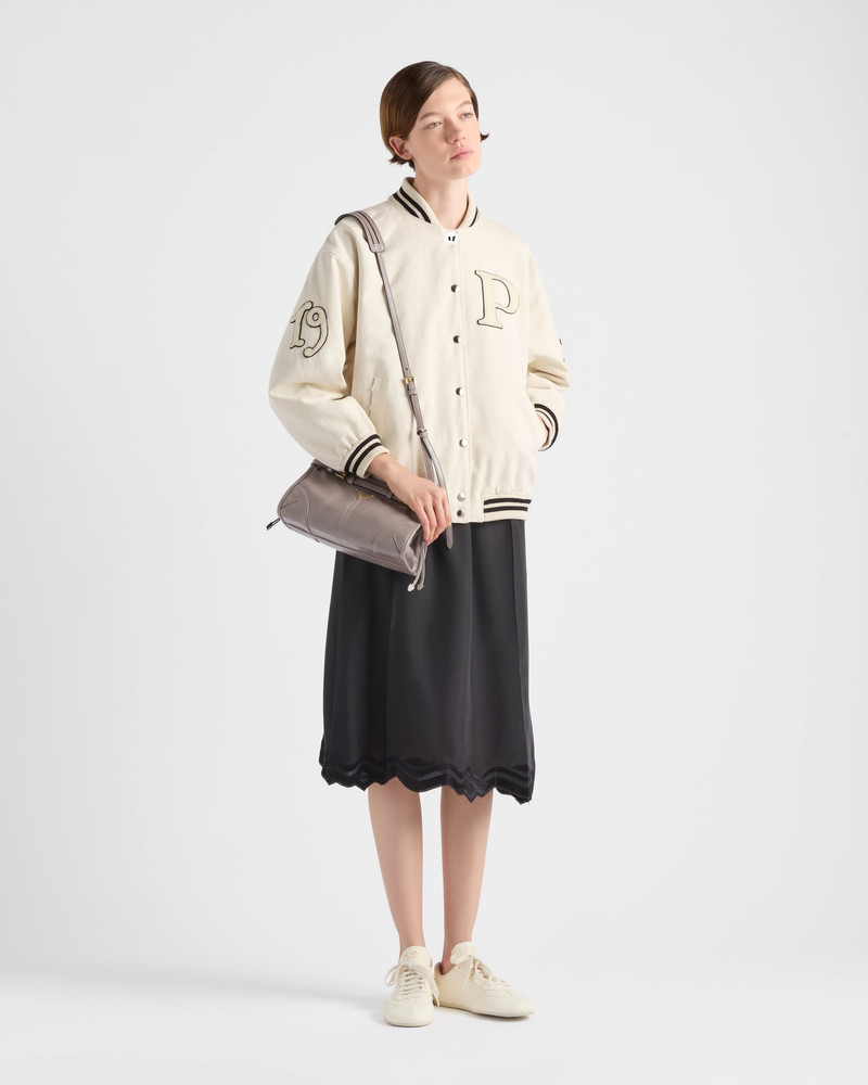 Prada Canvas bomber jacket with patches outlook
