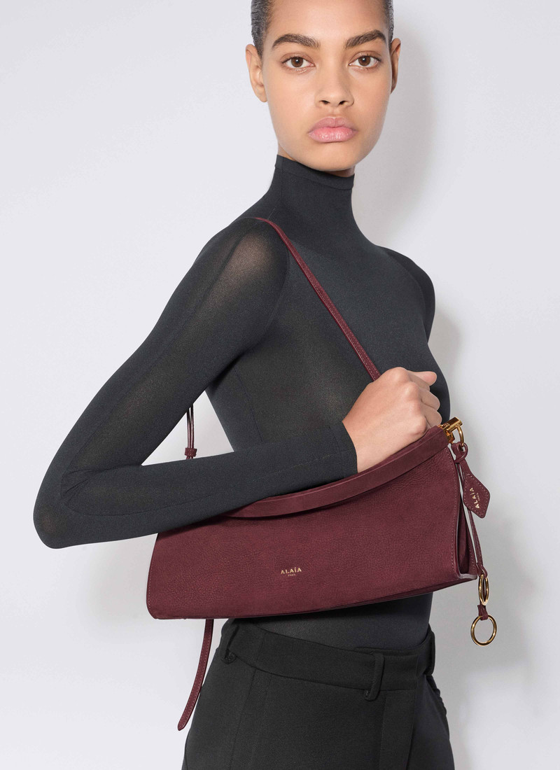 Alaïa LE CLICK EAST WEST MEDIUM BAG IN NUBUCK outlook