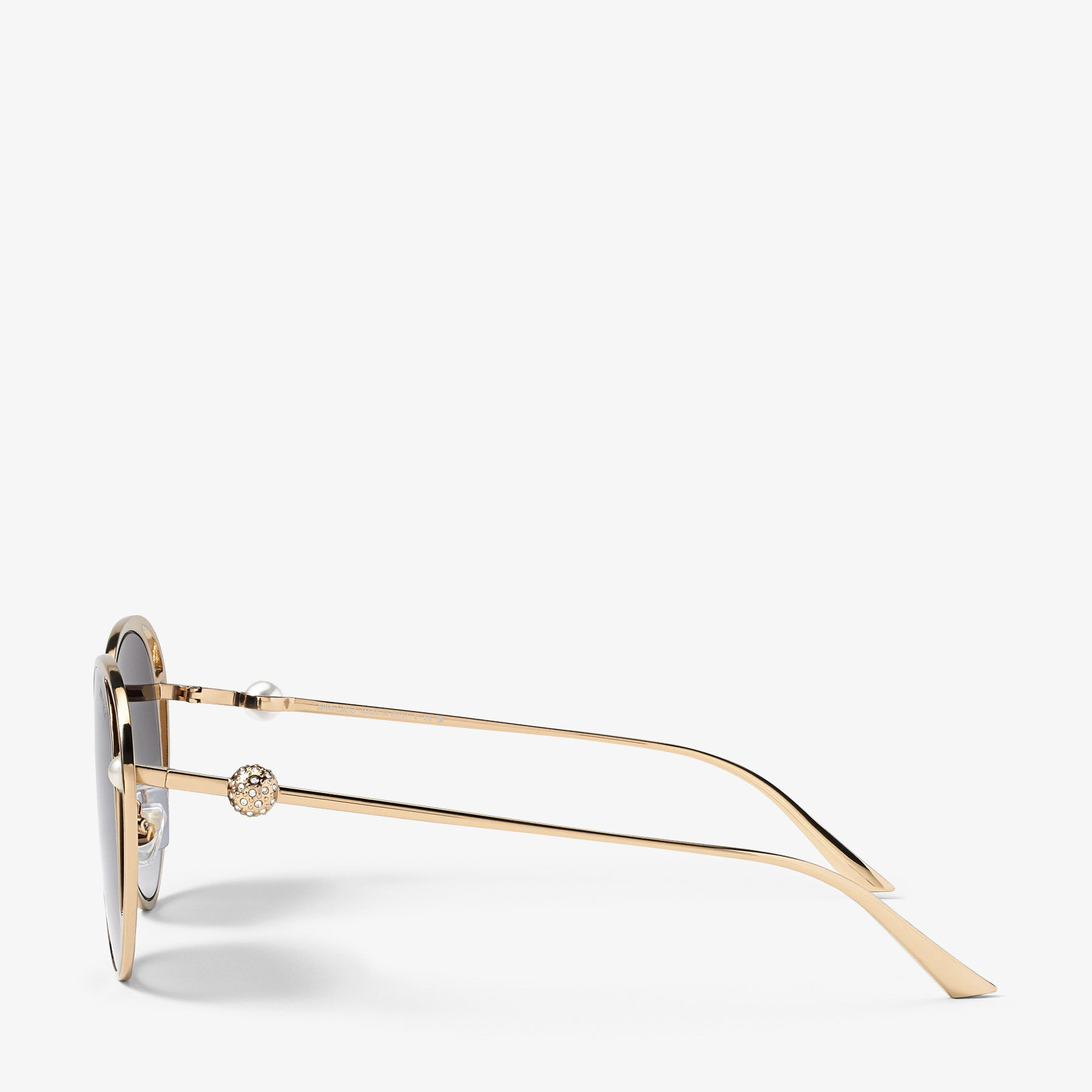 Angela
Pale Gold Oval Sunglasses - 3