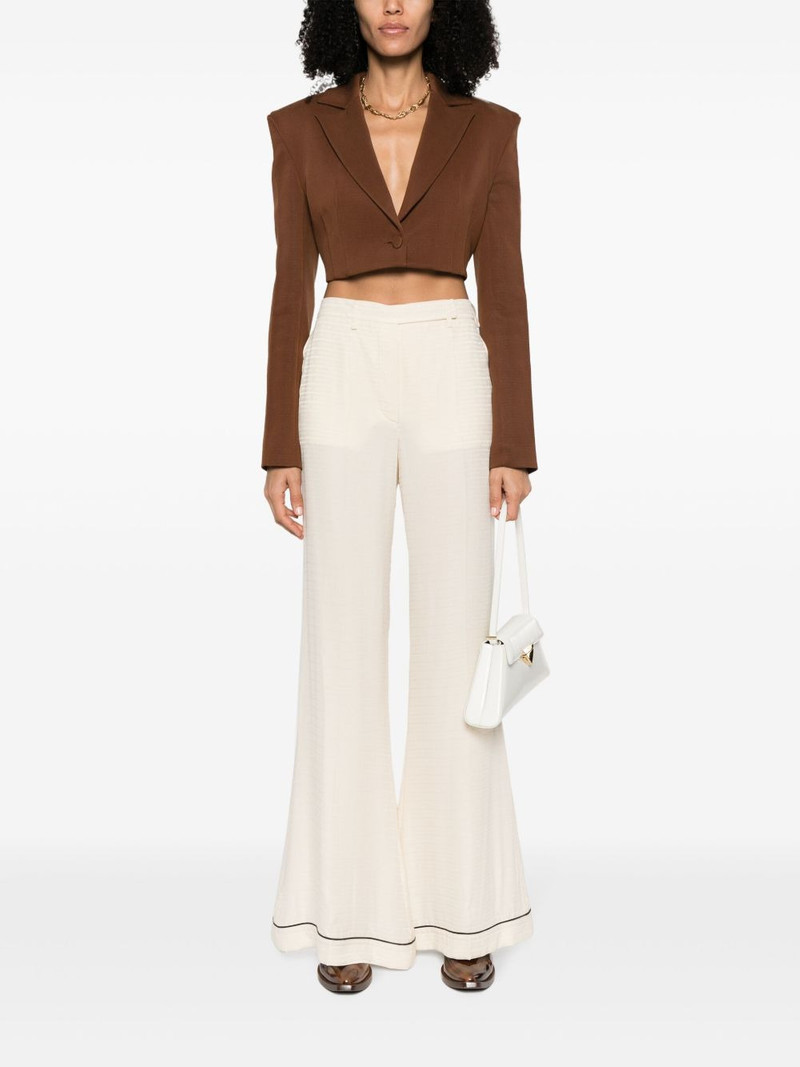 Prada high-waisted flared silk trousers outlook