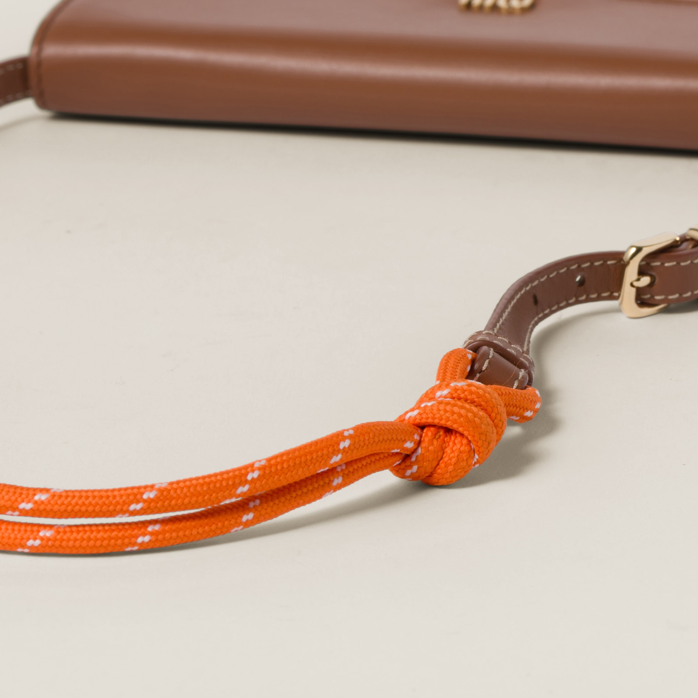 Miu Miu Leather wallet with leather and cord shoulder strap 