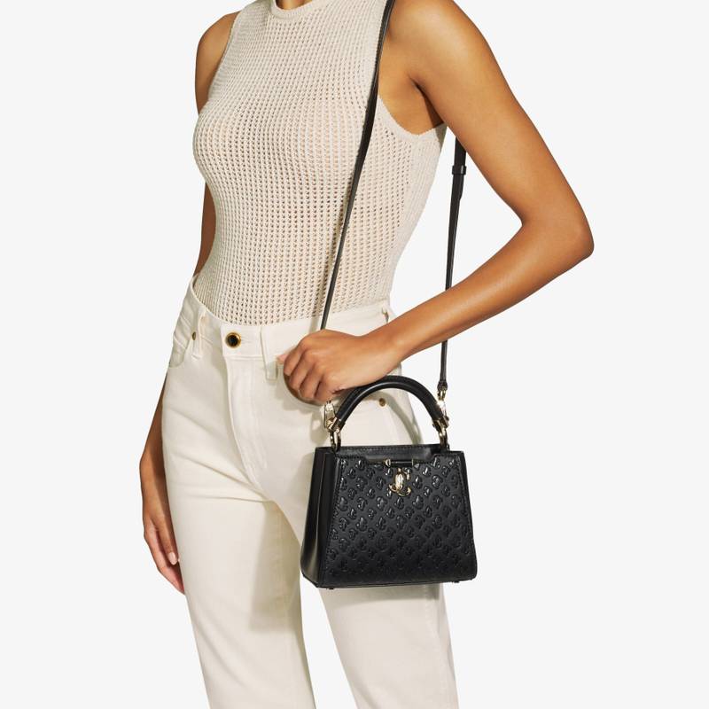 JIMMY CHOO Varenne Top Handle Mini
Black JC Monogram-Print and Leather Top Handle Bag outlook