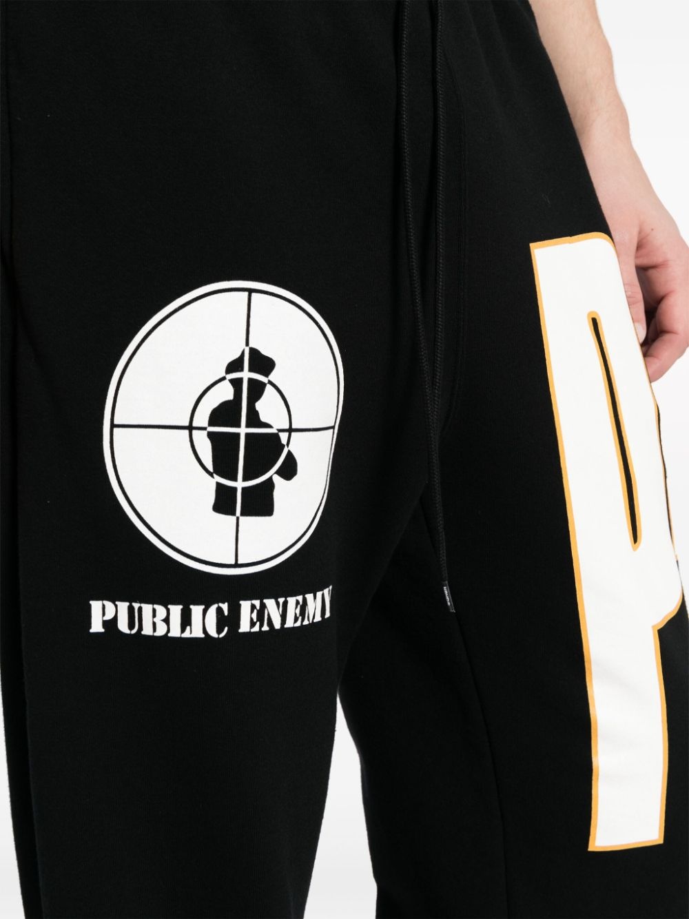 NEIGHBORHOOD x Public Enemy logo-print track pants | REVERSIBLE