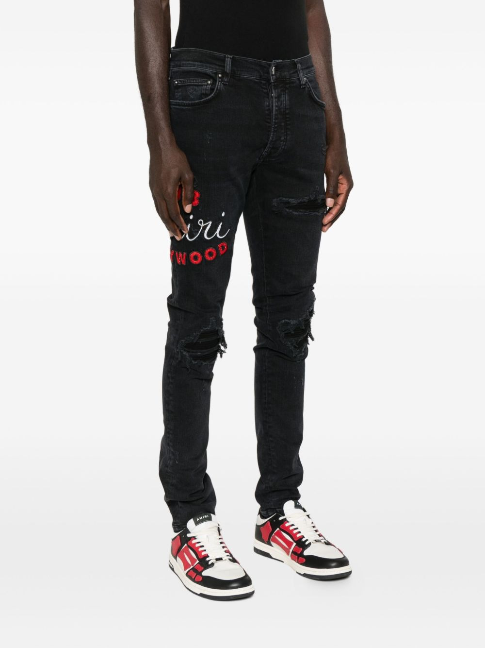 EMBROIDERED DISTRESSED JEANS - 4