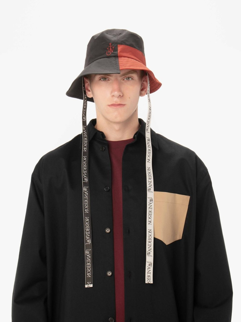 JW Anderson ASYMMETRIC COLOURBLOCK BUCKET HAT outlook